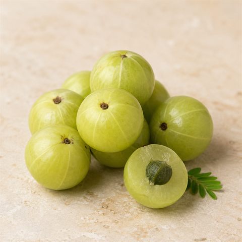 Grønne amla-frugter (indisk stikkelsbær)
